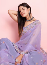 Heavy embroidered saree in violet colour